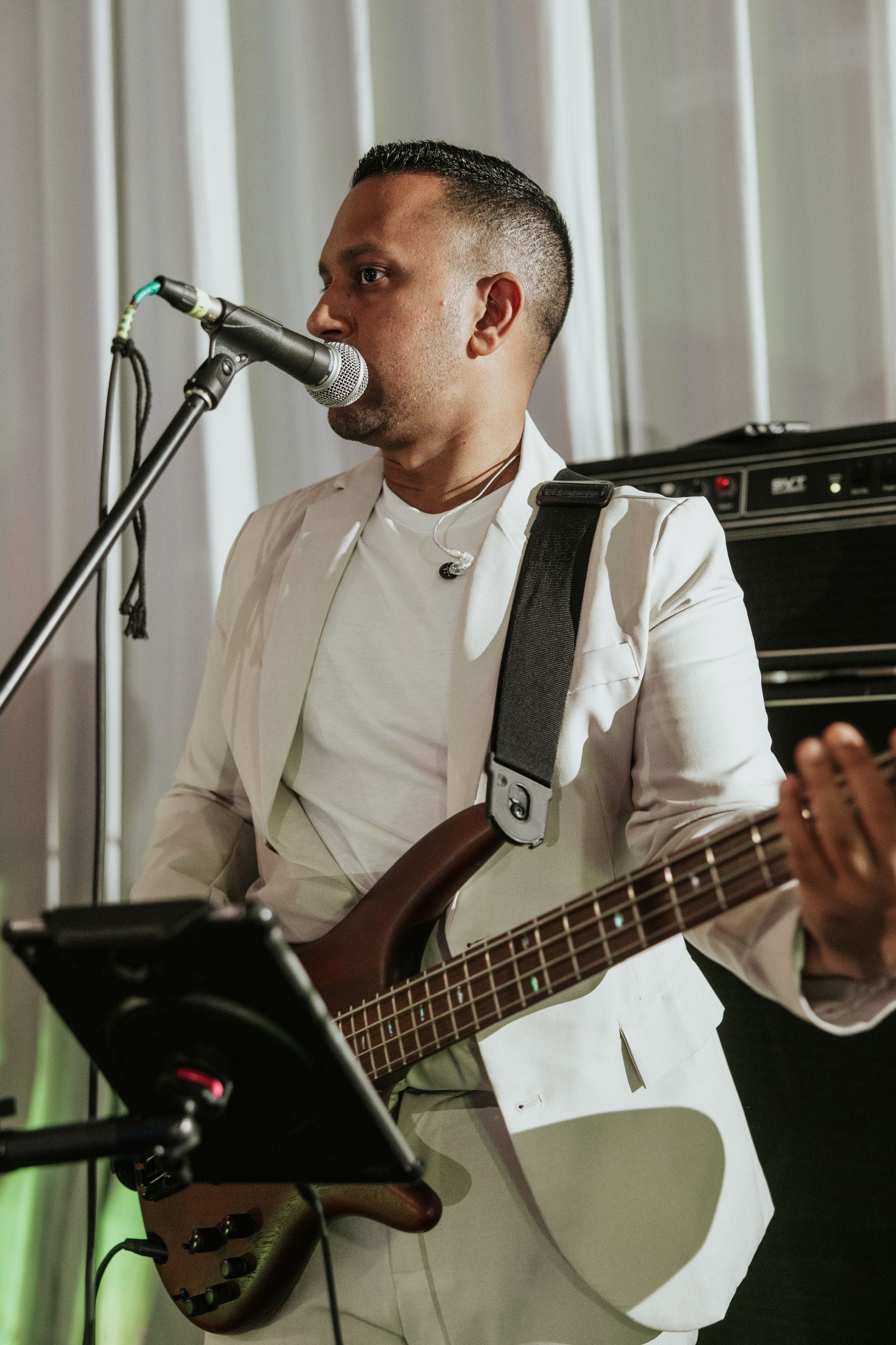 Guests of all ages dancing to Memory Lane at wedding